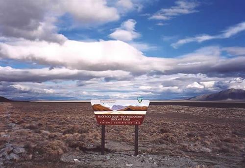 A sign in the desert that reads, "Black Rock Desert"